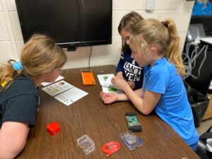 Students from Milan, Indiana work on building Kano kits in their school's new Girls Who Code club, funded by the RTF. 