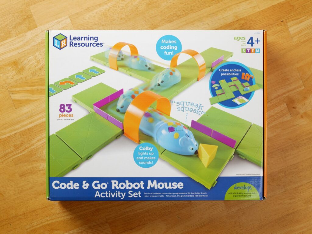 The code & Go Robot Mouse box, showing Colby, the blue mouse, moving through a course. 