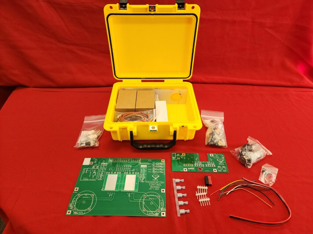 A kit for the underwater robotic camp sits on a table, with its various components neatly laid out. 