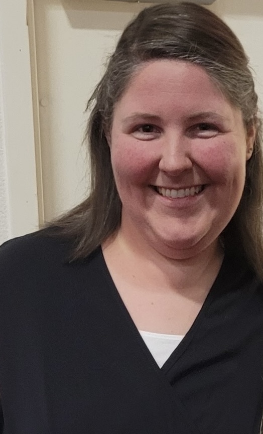 A photo of educator Beth Ann Pope smiling. 