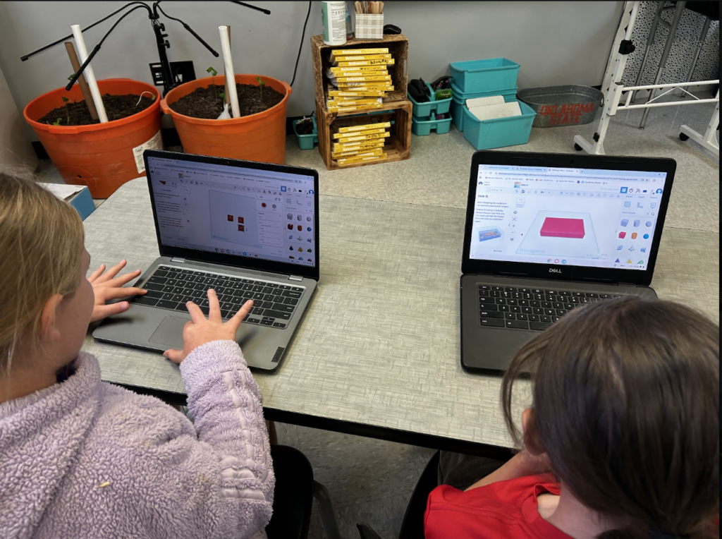 Two student laptops show work in TinkerCad, designing prints. 