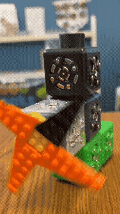 A gif of a Cubelet, with a spinning windmill-type attachment, at Rolla Public Library.