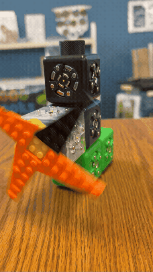 A gif of a Cubelet, with a spinning windmill-type attachment, at Rolla Public Library. 